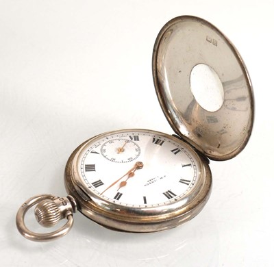 Lot 922 - A silver half hunter pocket watch by Benson,...