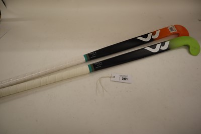Lot Mercian CF25i hockey stick, together with a...