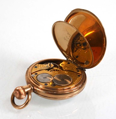 Lot 925 - A gold plated open face fob watch, the white...