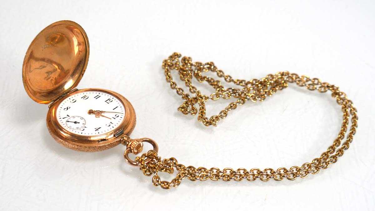 Lot 927 - A 14ct yellow gold fob watch, the white enamel...