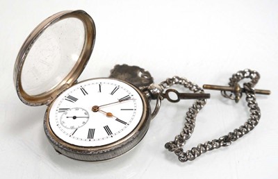 Lot 933 - A silver open face pocket watch, the white...