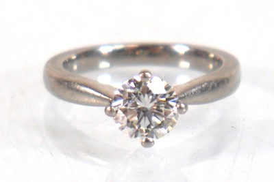 Lot 830 - A platinum ring set brilliant cut diamond in...