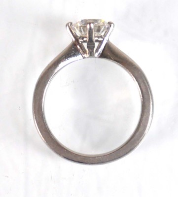 Lot 830 - A platinum ring set brilliant cut diamond in...