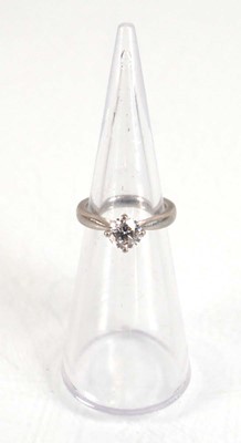 Lot 830 - A platinum ring set brilliant cut diamond in...