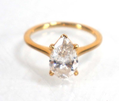 Lot 831 - An 18ct yellow gold ring set pear shaped lab...