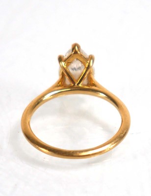 Lot 831 - An 18ct yellow gold ring set pear shaped lab...
