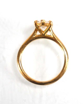 Lot 831 - An 18ct yellow gold ring set pear shaped lab...