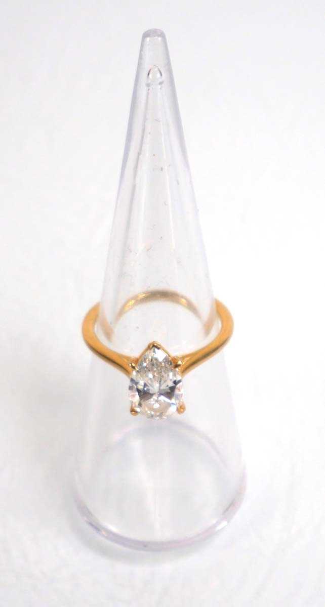 Lot 831 - An 18ct yellow gold ring set pear shaped lab...