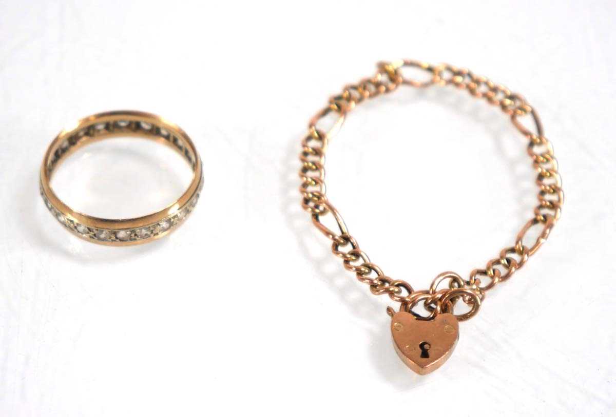 Lot 835 - A 9ct yellow gold child's figaro link bracelet,...