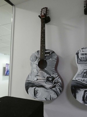 Lot 2195 - Two hand painted guitars by artist Lewyl,...