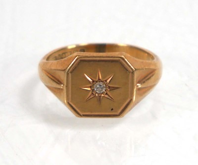 Lot 838 - A 9ct yellow gold signet ring set small...