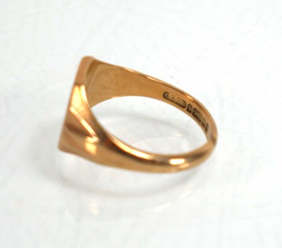 Lot 838 - A 9ct yellow gold signet ring set small...