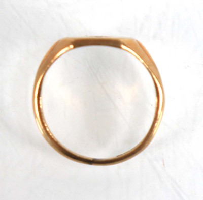 Lot 838 - A 9ct yellow gold signet ring set small...