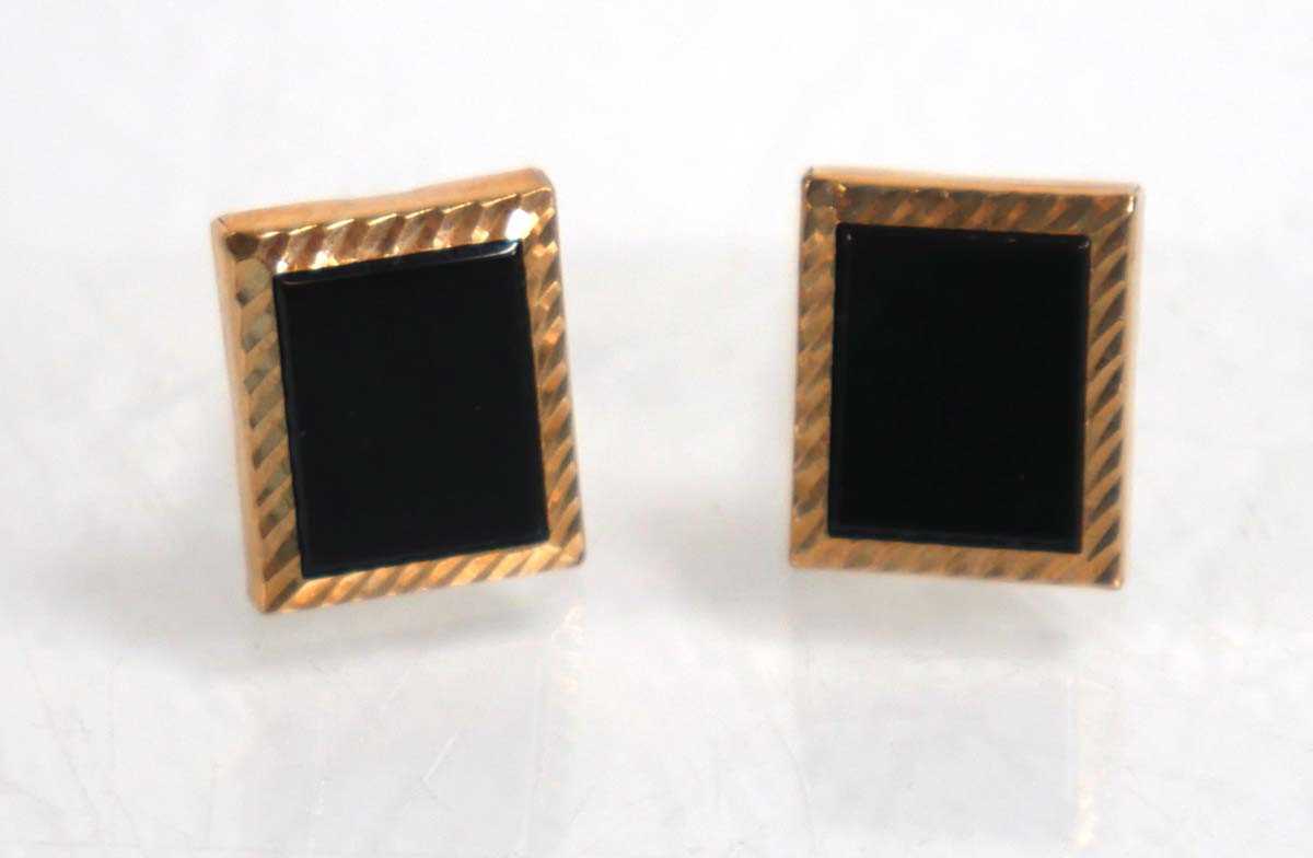 Lot 839 - A pair of 9ct yellow gold cufflinks of...