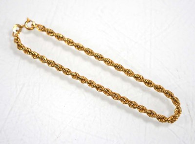 Lot 841 - A 9ct yellow gold ropetwist bracelet, l. 18 cm,...