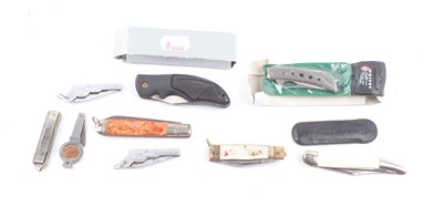 Lot 1491 - Two boxed Whitby folding knives, a Stag...