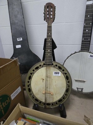 Lot 2372 - 7 string small banjo
