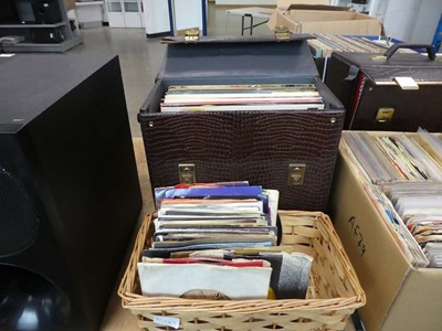 Lot 2497 - A box of vinyl LPs and a wicker basket of 7"...
