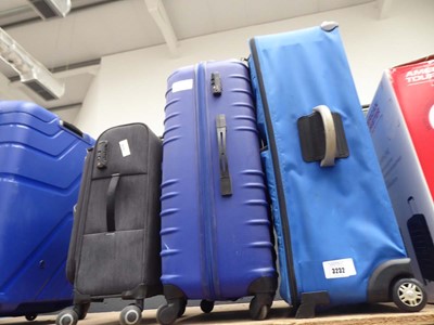 Lot 3232 - 2 large suitcases plus a fabric suitcase