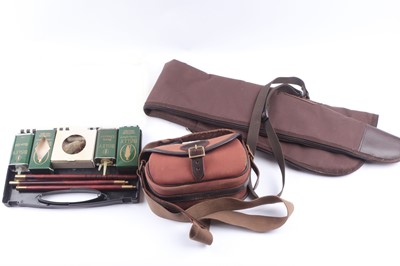 Lot 1134 - Canvas and leather cartridge bag, gun slip,...