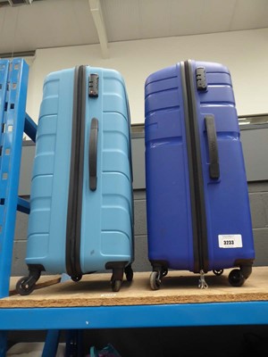 Lot 3233 - 2 large hard shelled American Tourister suitcases