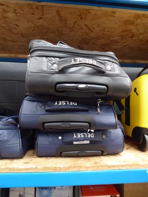 Lot 3242 - 3 Destiny Paris roller duffel suitcases
