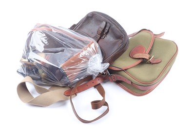 Lot 1323 - Two gun slips, two cartridge bags, 12 bore...