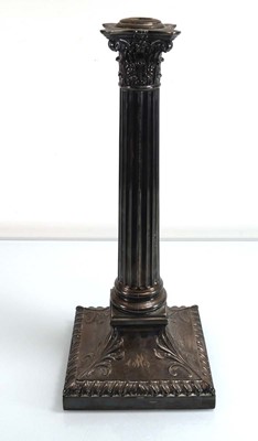 Lot 447 - An Edwardian silver candlestick of Corinthian...