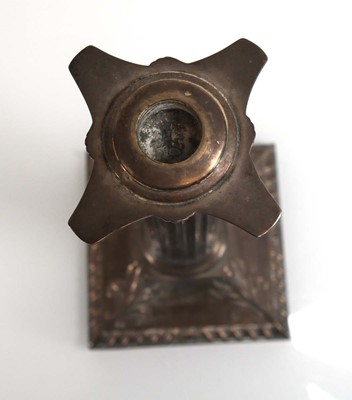 Lot 447 - An Edwardian silver candlestick of Corinthian...
