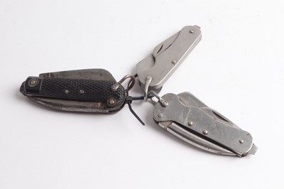 Lot 1148 - Three Sheffield military folding knives:...