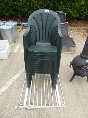 Lot 4180 - 10 plastic garden stacking chairs and a stairgate