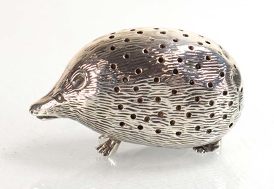 Lot A silver pin cushion modelled as a hedgehog,...
