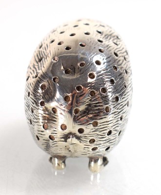 Lot A silver pin cushion modelled as a hedgehog,...