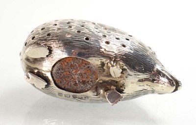 Lot A silver pin cushion modelled as a hedgehog,...