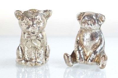 Lot A silver pin cushion modelled as a seated cat,...