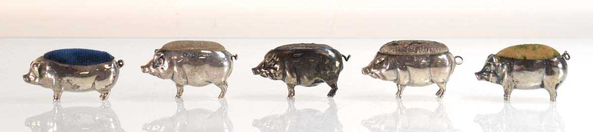 Lot Five silver pin cushions, each modelled as a...