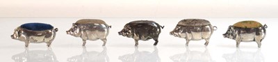 Lot Five silver pin cushions, each modelled as a...
