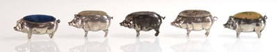 Lot Five silver pin cushions, each modelled as a...