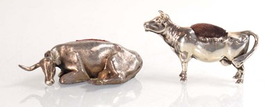 Lot A silver pin cushion modelled as a standing...