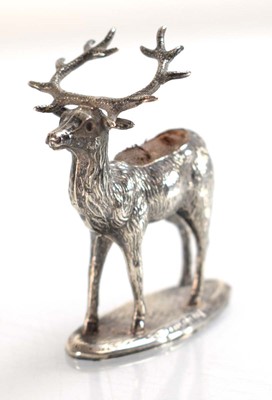 Lot A silver pin cushion modelled as a stag, Adie...