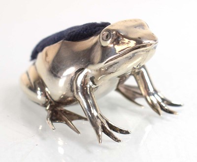 Lot A silver pin cushion modelled as a frog, Adie...