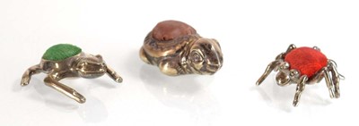 Lot A silver pin cushion modelled as a spider,...