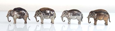 Lot Four silver pin cushions, each modelled as a...