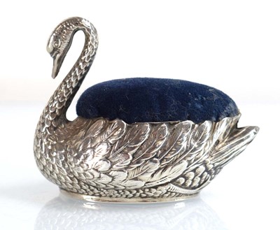 Lot A silver pin cushion modelled as a swan,...