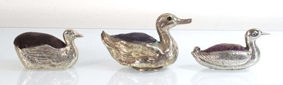Lot A silver pin cushion modelled as a duck, Levi...