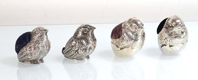 Lot A silver pin cushion modelled as a chick, Levi...