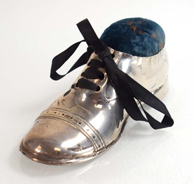 Lot A silver pin cushion modelled as a brogue shoe,...