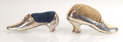 Lot A silver pin cushion modelled as a shoe,...