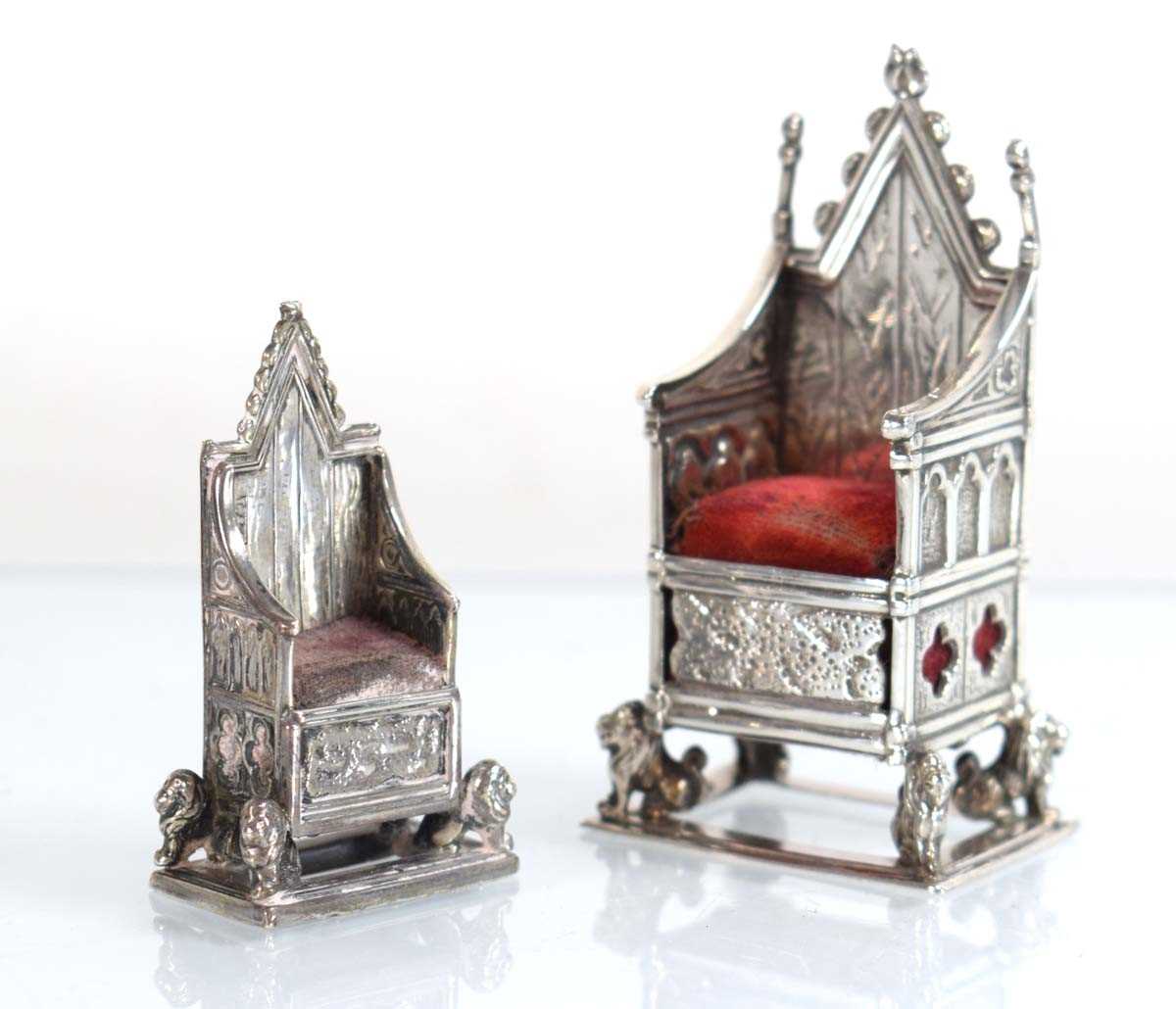 Lot A silver pin cushion modelled as the...
