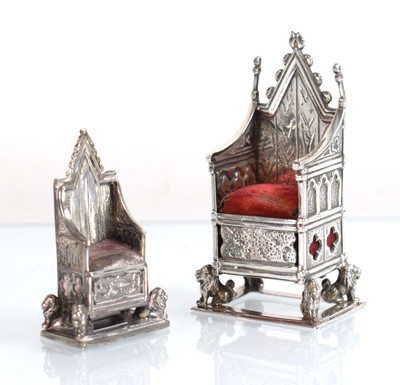 Lot A silver pin cushion modelled as the...